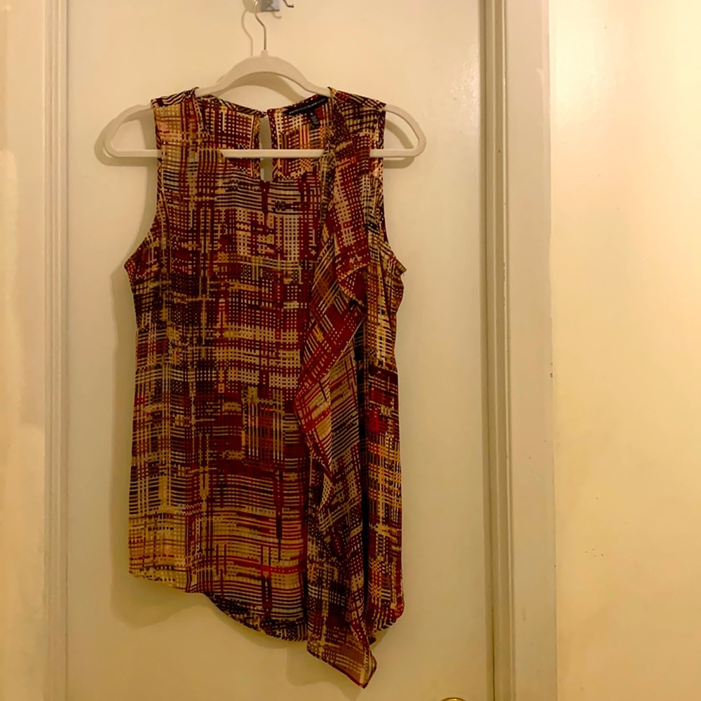 White House Black Market Colorful sleeveless blouse. Great for work or play.